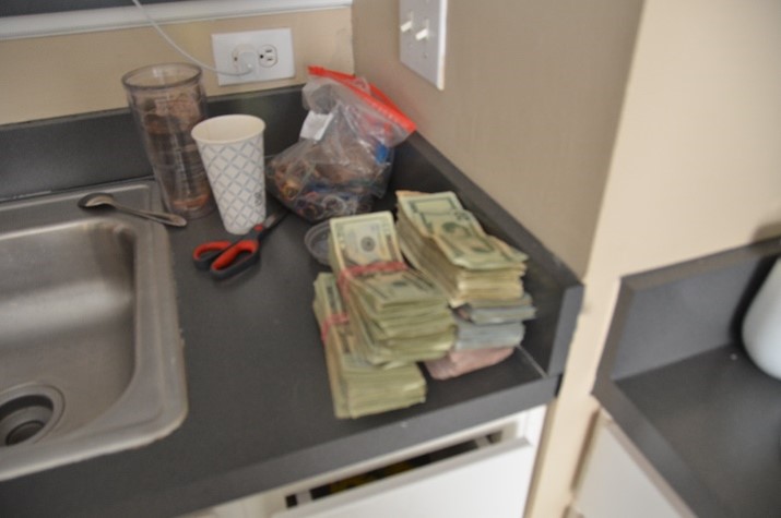 Seized drugs and cash